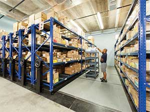 Movable shelving for manufacturing storage